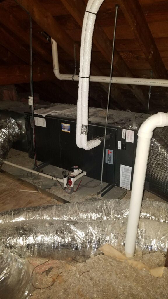 View of the existing ductwork in this Arlington, MA, home where a Mitsubishi AC system was installed.