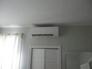 Indoor ductless AC unit installed in a Boston home for Mitsubishi Electric ductless heating and cooling system.