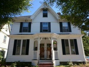 Two-family home in Boston, MA, gets supplemental heating and cooling with Mitsubishi ductless. 