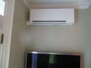 Example of an indoor Mitsubishi ductless AC unit installed in a home for supplemental heating and cooling.