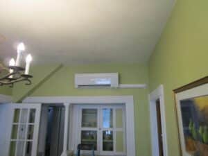 Example of an indoor Mitsubishi ductless air handler installed in Boston two-family home.