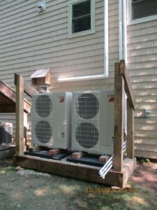 Outdoor condenser units for this air conditioning and heating upgrade for Halifax, MA, home.