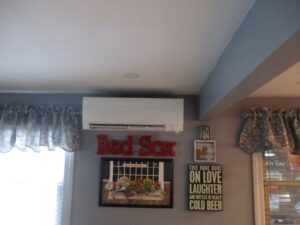 Example of an indoor ductless wall unit installed in a Framingham, MA, home to replace oil heat. 