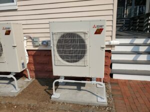 An outdoor unit with cold climate heating for this Mitsubishi Electric ductless installation.