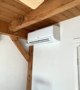 Another example of a wall-mounted Mitsubishi MSZ-GL unit in the bedroom for Mitsubishi ductless system installation.