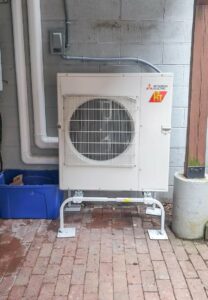 Mitsubishi Electric heat pump installed outside Boston Brownstone condo.