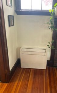 An example of a floor-mounted ductless heating and cooling unit in an Arlington home.