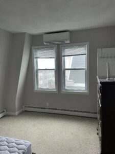 Indoor ductless air conditioning unit in a condo in Boston, MA.