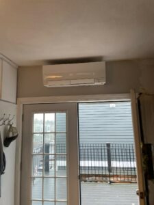 Wall-mounted ductless mini-split AC unit in Boston condo.