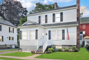 A Dutch-style home in Methuen, MA, gets Mitsubishi Electric ductless heating and cooling system with Hyper Heat technology.