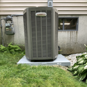 Outdoor condenser unit for Lennox Elite air conditioning system replacement in Bridgewater, MA.