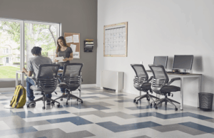 A man and woman in an office.